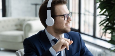 Photo of a man with headphones on 