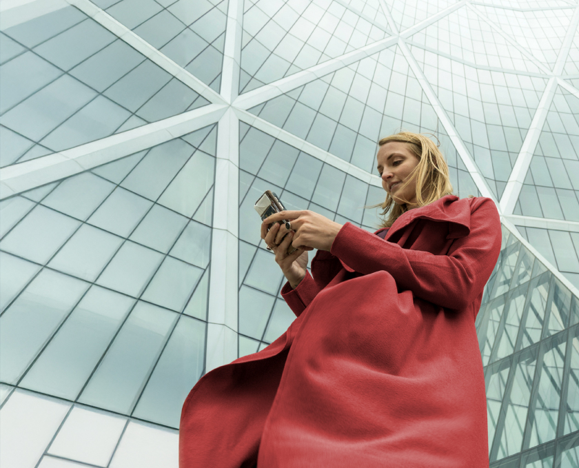 Photo of a woman looking at her phone